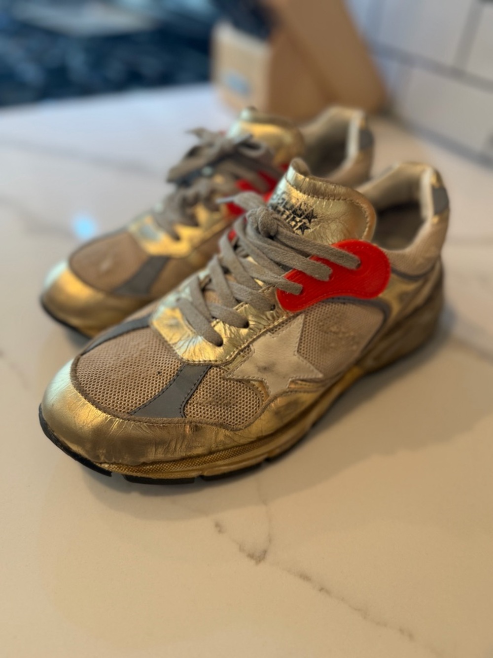 Golden Goose Dadstar Metallic Gold Sneakers with Red orange Eyelet Accents - Picture 2 of 9